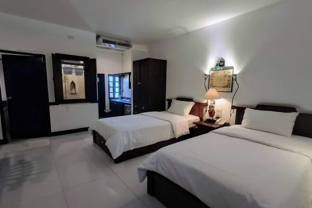 Desk, blackout curtains, rollaway beds, free WiFi