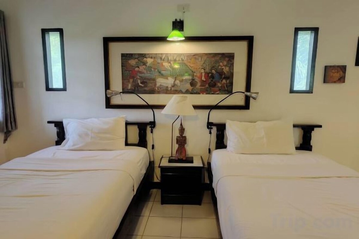 Desk, blackout drapes, rollaway beds (surcharge), WiFi (free)