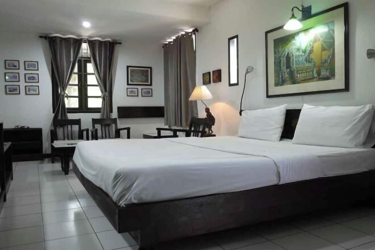 Desk, blackout curtains, rollaway beds, free WiFi