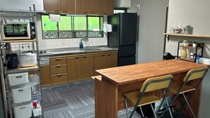 Fridge, microwave, stovetop, cookware/dishes/utensils