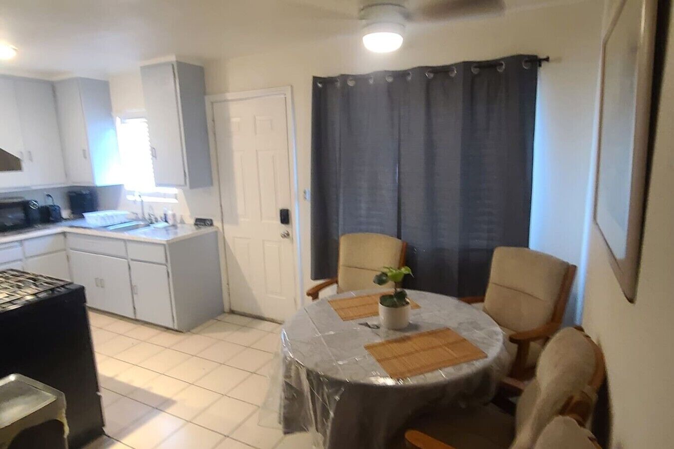 Fridge, oven, stovetop, dining tables