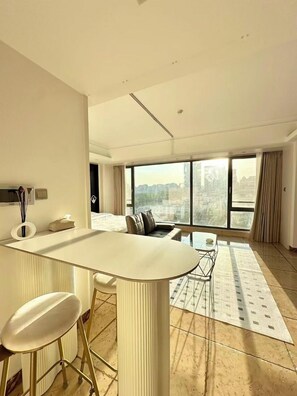 Luxury Double Room, City View | Living area | Heated floors - Yoki shimao international apartment (Beijing)