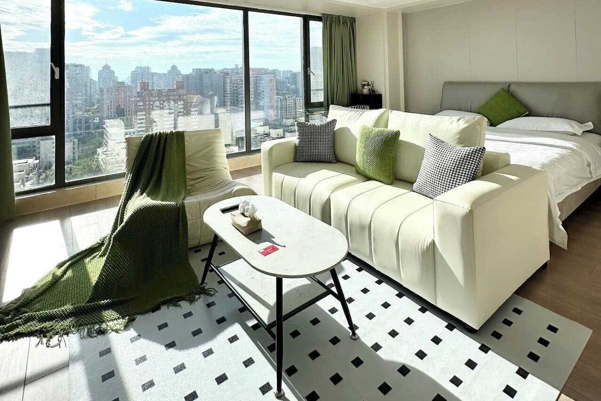 Habitación doble superior, vistas a la ciudad | Zona de estar
