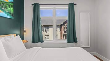 1 bedroom, desk, iron/ironing board, travel crib