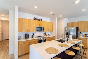 Fridge, microwave, dishwasher, coffee/tea maker