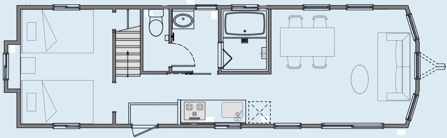 A floor plan of a hotel with a kitchen, dining area, and a bathroom.