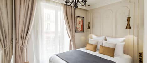 Hypo-allergenic bedding, pillow-top beds, in-room safe