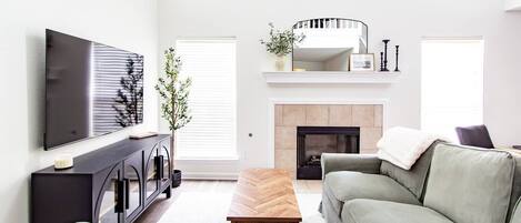 Smart TV, fireplace, foosball, books