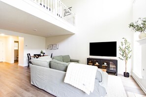 Smart TV, fireplace, table football, books