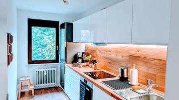 Réfrigérateur, four, plaque de cuisson, lave-vaisselle