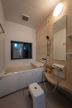 Hair dryer, bidet, towels, soap