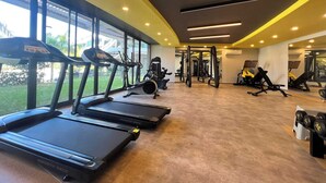 A gym with treadmills, weight machines, and a weight bench. - Modern Comfort in Oba: New 1+1 Apartment in Sol Garden (Alanya)