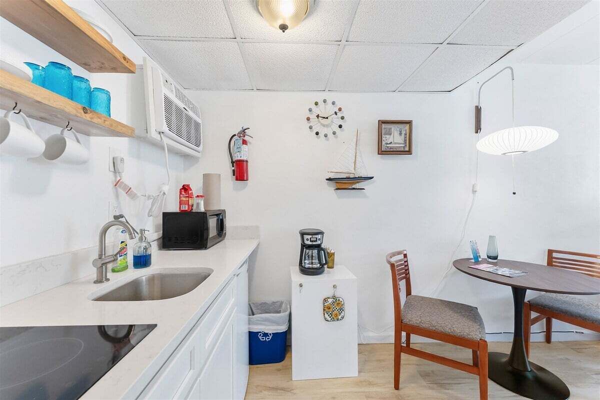 Fridge, microwave, stovetop, coffee/tea maker