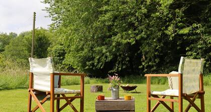 Iris, Lilypad and Bulrush are luxury bell tents all set privately in a wild meadow.