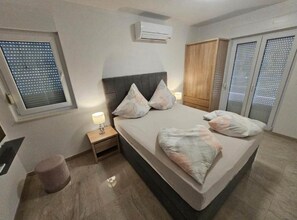 Apartamento | 3 dormitorios y tabla de planchar con plancha