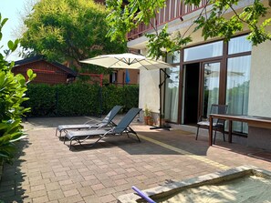 Studio Comfort - utsikt mot trädgården | Terrass/Patio