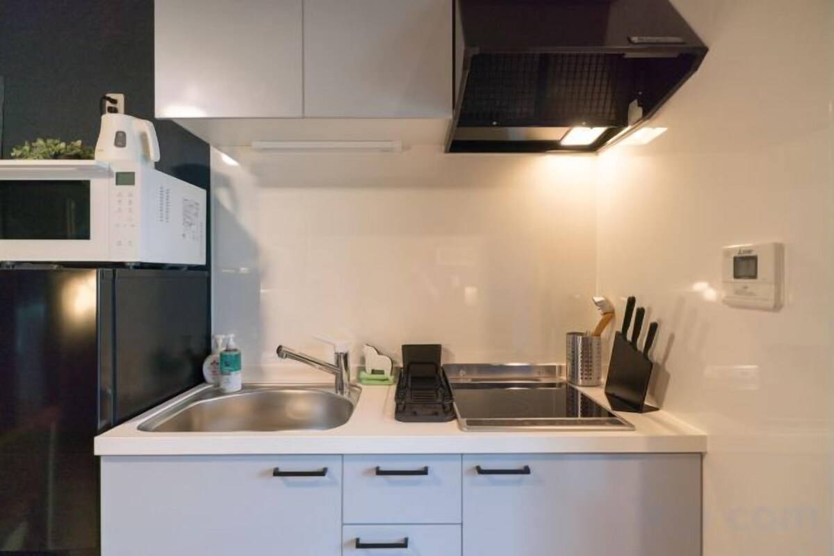 Cuisine privée | Réfrigérateur, four à micro-ondes, surface de cuisson