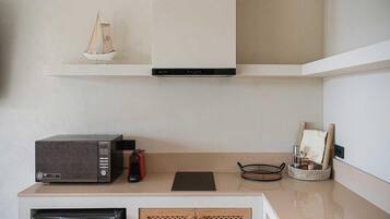 Microwave, stovetop, coffee/tea maker, toaster