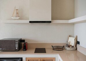 Microwave, stovetop, coffee/tea maker, toaster