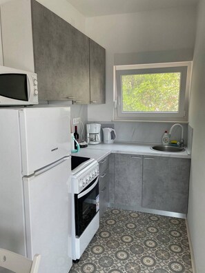 Lägenhet | Eget kök | Kylskåp, mikrovågsugn, ugn och spishäll