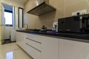 Fridge, microwave, stovetop, cookware/dishes/utensils