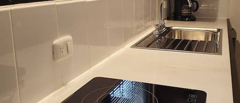 Microwave, coffee/tea maker, cookware/dishes/utensils