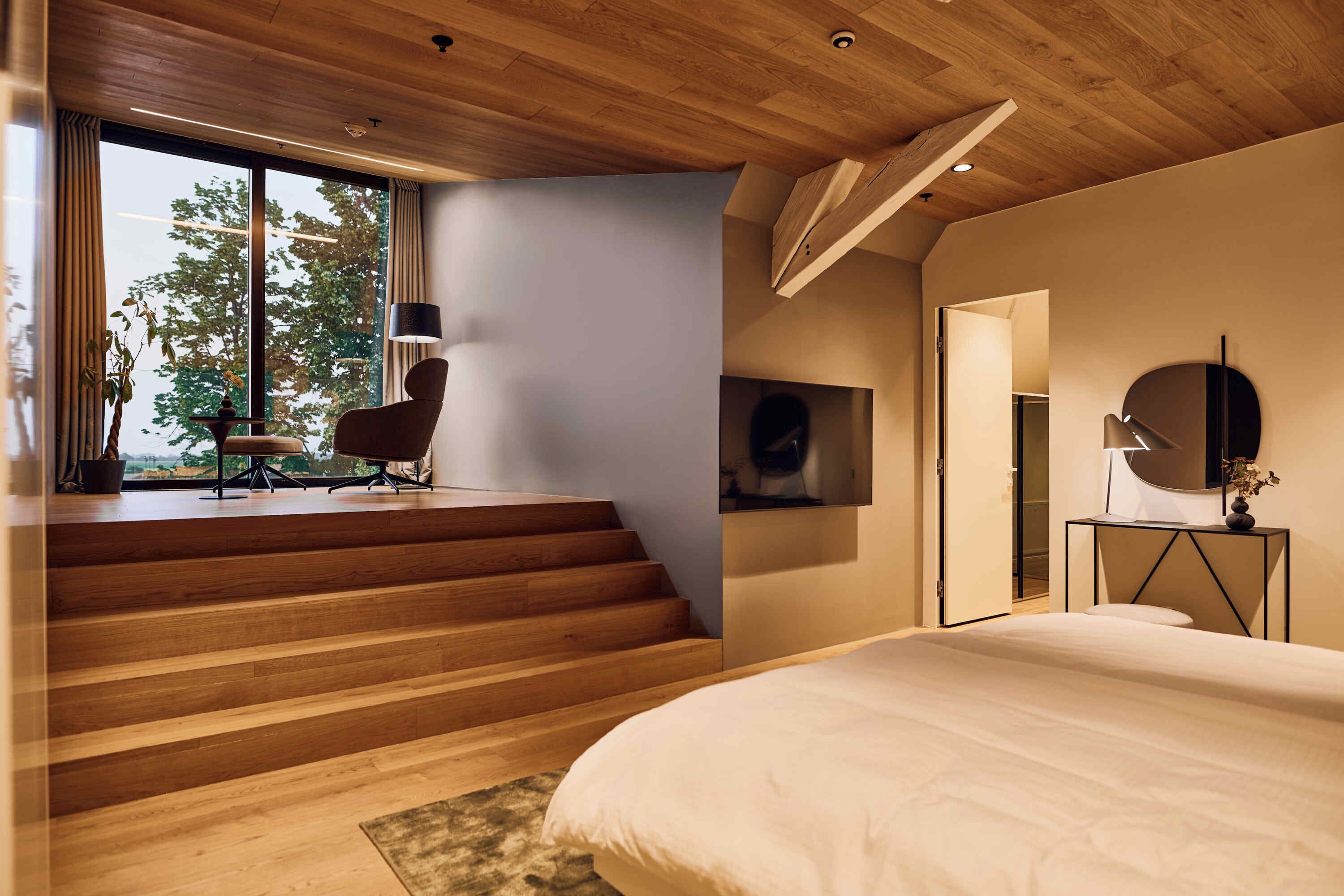 Penthouse, vue parc | Minibar, coffres-forts dans les chambres, bureau