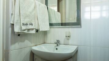 Shower, towels, soap, shampoo