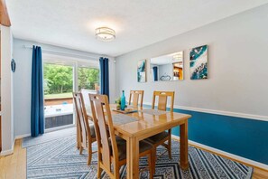 Dining - A dreamy Seneca Lake retreat with sweeping views, a relaxing hot tub under the stars, flexible bedroom setups, a fully stocked kitchen, cozy living spaces, and easy access to the lake, wineries, and waterfalls. (Romulus)