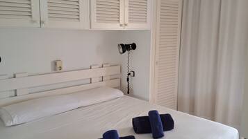 2 dormitorios, tabla de planchar con plancha, wifi y ropa de cama