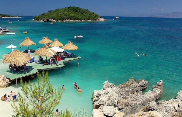 Beach nearby, white sand, beach cabanas, sun-loungers