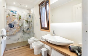 Shower, hair dryer, towels