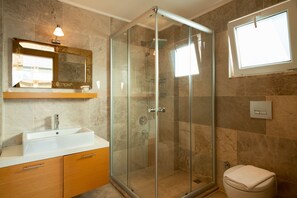 Shower, hair dryer, towels, toilet paper