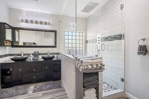 Shower, hair dryer, towels, shampoo