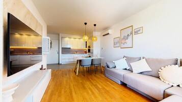 Deluxe Apartment, Balcony, Sea View | Living area