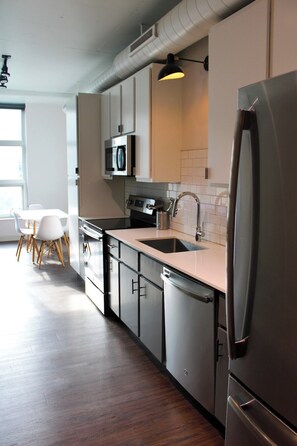 Fridge, stovetop, dishwasher, cookware/dishes/utensils