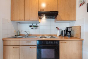 Fridge, microwave, coffee/tea maker, high chair