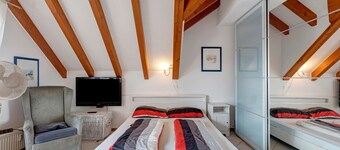 Apartamento 'Tetto Piccolo' con jardín compartido y Wi-Fi