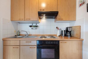 Fridge, microwave, coffee/tea maker, highchair