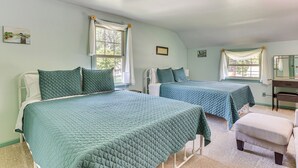 A room with two beds, a desk, and a chair. - 1 Mi to Dtwn Salem: Apt w/ Garage Access! (Salem)