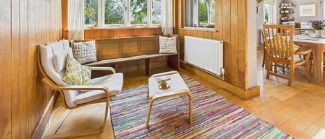 TV, fireplace, books, offices