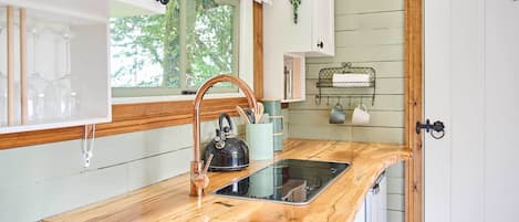 Fridge, coffee/tea maker, electric kettle, toaster