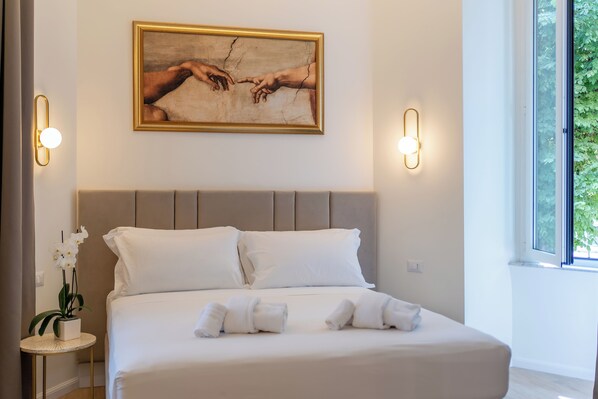Deluxe Double or Twin Room, City View | In-room safe, desk, laptop workspace, blackout drapes