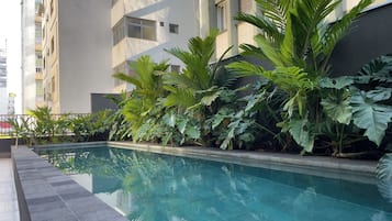 Outdoor pool, pool umbrellas, pool loungers