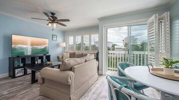 Condo, 1 Queen Bed with Sofa bed, Balcony, Garden View (Emerald Isle Escape) | Living area | 42-inch flat-screen TV with digital channels