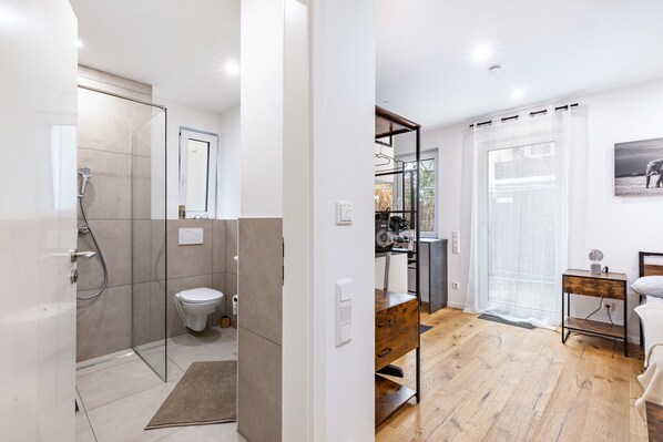 Shower, hair dryer, towels