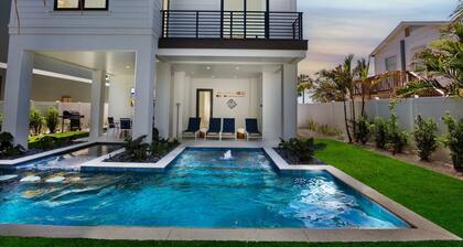 Luxurious Gulf-View Retreat with Rooftop Deck and Private Pool