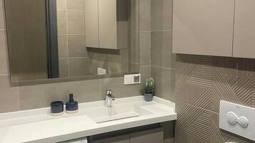 Hair dryer, towels, soap, toilet paper