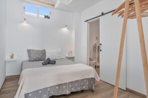 A bedroom with a bed, bedside tables, a window, and a wooden ladder. - Vacation 'Rincón De Agustín' with Mountain View, Private Terrace and Wi-Fi (Macher)