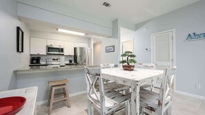 Condo, Multiple Beds, Balcony, Garden View (Sunshine & Whiskey) | Dining - Sunshine & Whiskey Condo for 6 With Resort Amenities Near Grand Boulevard (Miramar Beach)